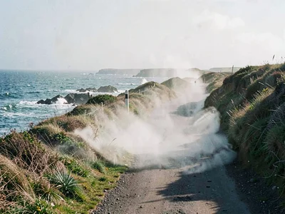 Coastal path in moderate spray