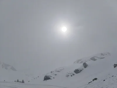 Sun location visible as brighter white area