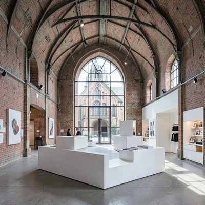 Medieval-modern temporal collision, Ghent layers, Art gallery white cube install