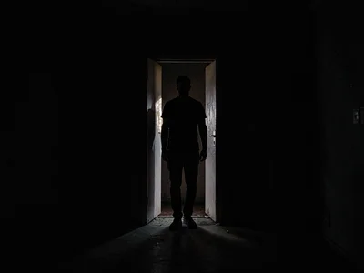 Figure in doorway silhouette