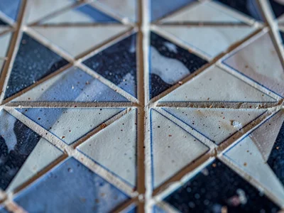 Tile surface texture showing handmade facets