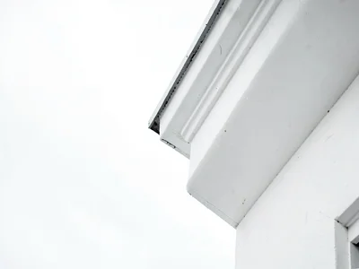 Cornice edge against white sky