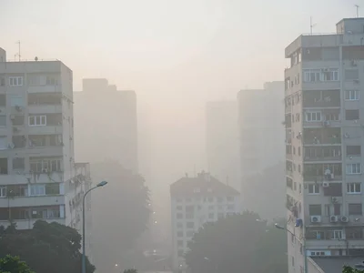 Buildings layered by smog depth