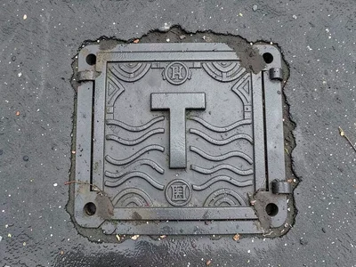 Telecommunications Vault Cover with Cable Pattern