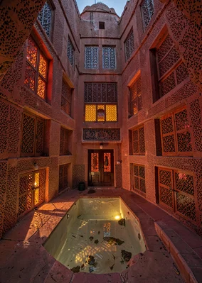Colored light through qamariya windows in Sana'a, Yemen, interior courtyard of t