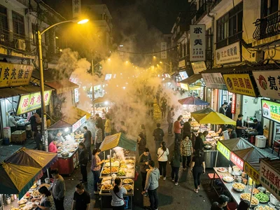 Night market crowd above