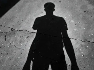 Person shadow longer than frame