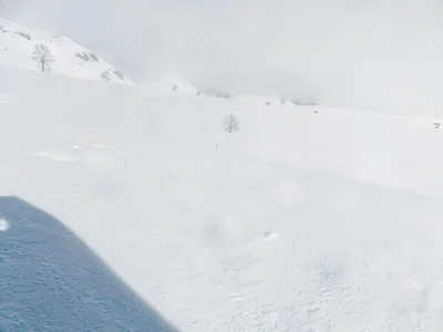 Blue shadow at edge of white expanse
