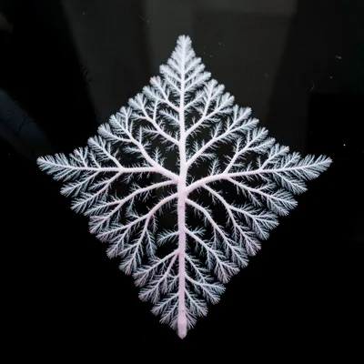 Dendrite spread on cold black glass forming a rough triangular fan with secondar