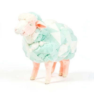 Woolly cream lowpoly sheep with a triangulated mint cloud body and peach legs, o