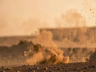 Dust particles catching light creating visible air texture