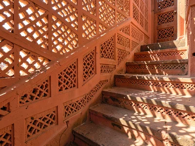 Afternoon sun through mashrabiya lattice in Lamu, Kenya, Coral stone staircase, 