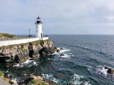 Lighthouse on cliff edge