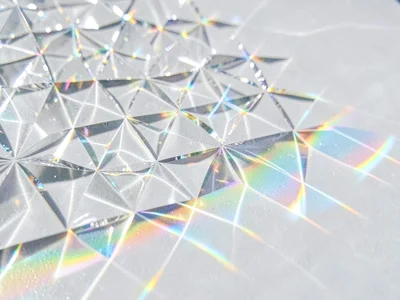 Diamond pattern of dispersed light on white surface