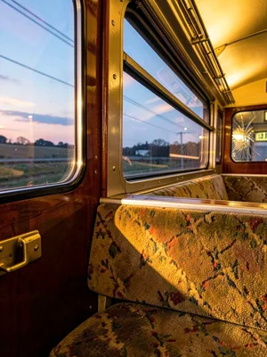 Train Window Dusk Golden Moquette Armrest