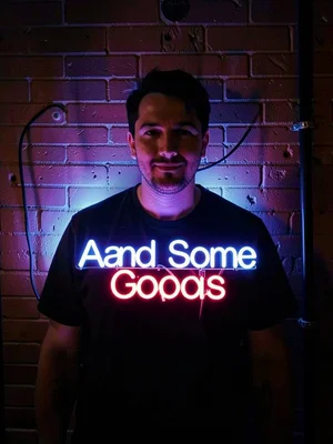 Figure under neon sign