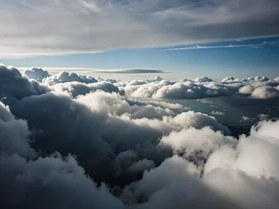 Cloud shadow falling on distant cloud creating depth layers