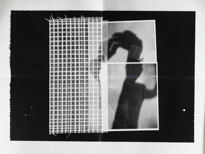 A photogram of fabric netting — grid of transparency, light and dark zones