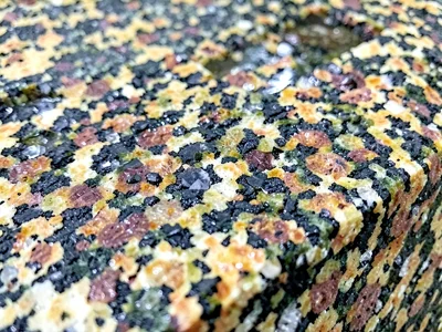 Rain-wet granite showing crystal detail