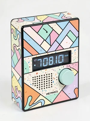 Clock radio Memphis treatment, geometric speaker grille, pastel digital numbers