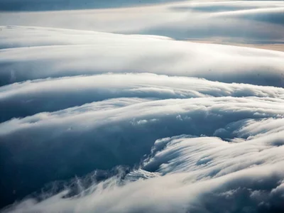 Billows in stratified cloud layer showing wave dynamics