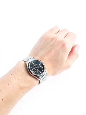 Watch on wrist, white backdrop