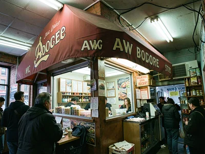 Awning with store name, character typography, the unique bodega identity