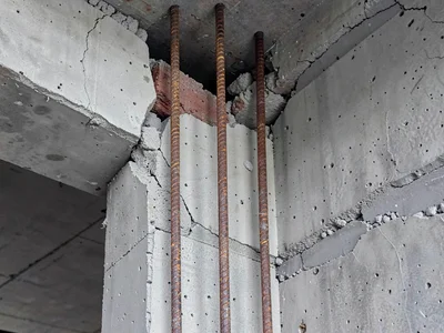 Rebar visible in broken concrete