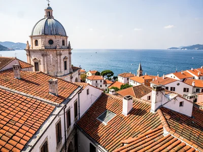 Cathedral dome above terracotta sea