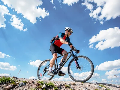 Cyclist against sky