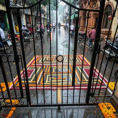 Looking down at Chennai's overlooked patterns, Kolam visible through wrought iro