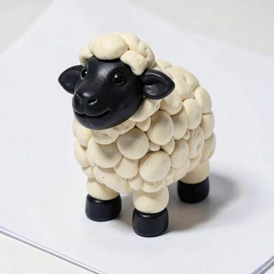 Fluffy chunky clay sheep in cream-white with chunky stubby legs, oversized round