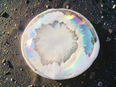 Film thinning before burst showing pale
