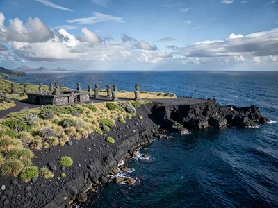 Edge-of-world isolation on Rapa Nui, The coast where black volcanic rock meets t