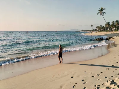Person on beach from far