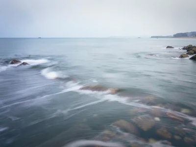 Fog and sea blurring together at horizon