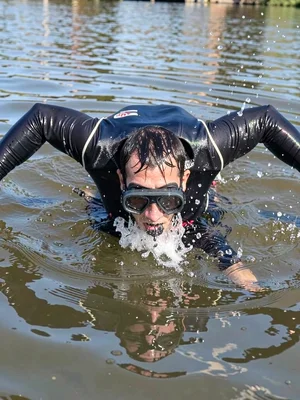 Diver entering water