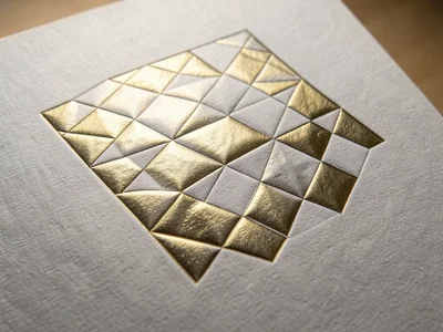 Embossed foil with geometric diamond quilt pattern, each diamond at slightly dif