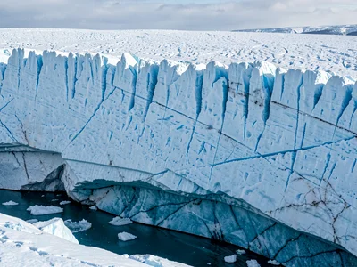 Ancient ice at glacier base showing compression