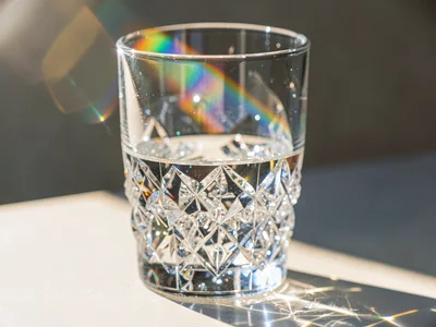 Rainbow caustic from drinking glass in afternoon sun