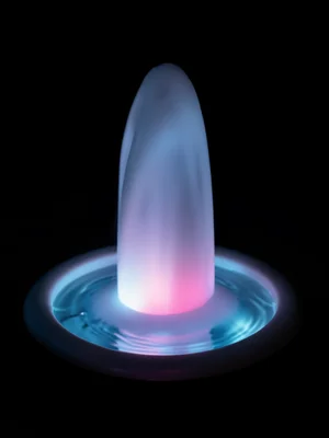 Laminar flow fountain, perfectly smooth water cylinder, colored light inside