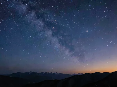The exact moment when first stars appear while sky is still indigo
