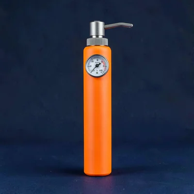 single matte-finish portable bike-pump in safety-orange straight-on against a de
