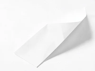 White paper folded creating shadow