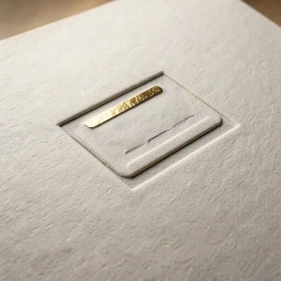 Multi-level emboss, three heights of relief creating depth illusion, embossing d