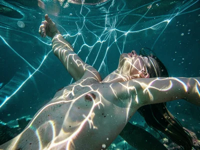 Caustic on human form underwater