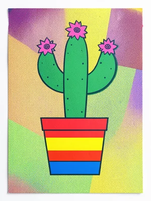 A cactus in a geometric pot — the pot has horizontal stripes in red, yellow, and