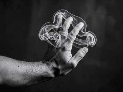 Air current around hand showing finger-induced vortices