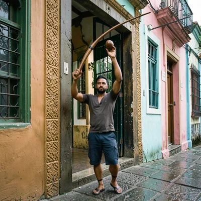 Salvador Pelourinho color, Bahian colonial saturation, A young man playing berim