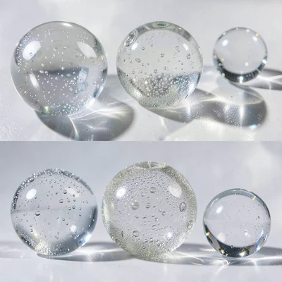 Glass fishing floats, spherical sea-worn glass, maritime transparency